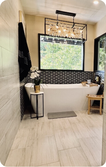  Serene ambiance in a bathroom with natural light and stylish decor.